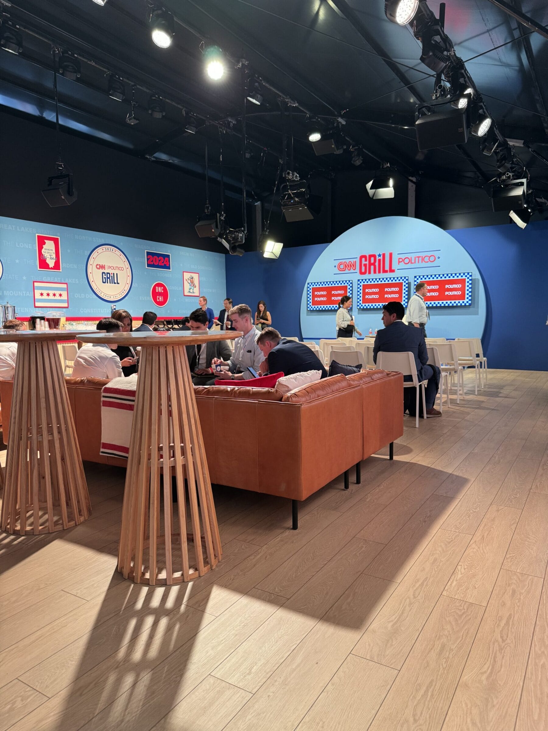 CNN Grill Politico set with people seated on couches and standing.