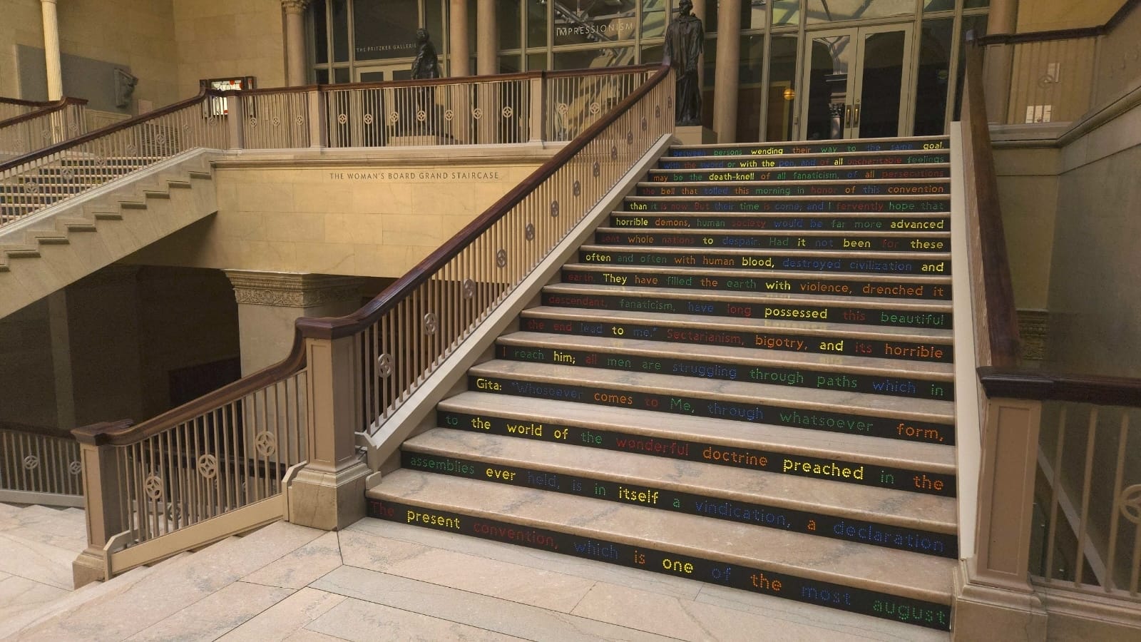 Grand staircase with steps inscribed with colorful text.